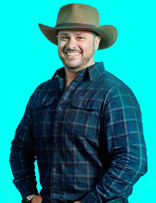 Mark posing with a cowboy hat on